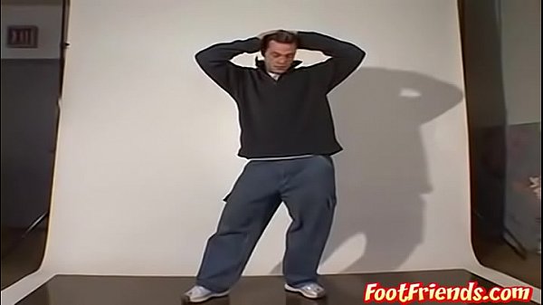 Muscle Jock Luciano stripteasing before foot fetish torment