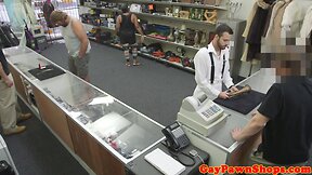 Straight guy sucks pawnbroker behind counter
